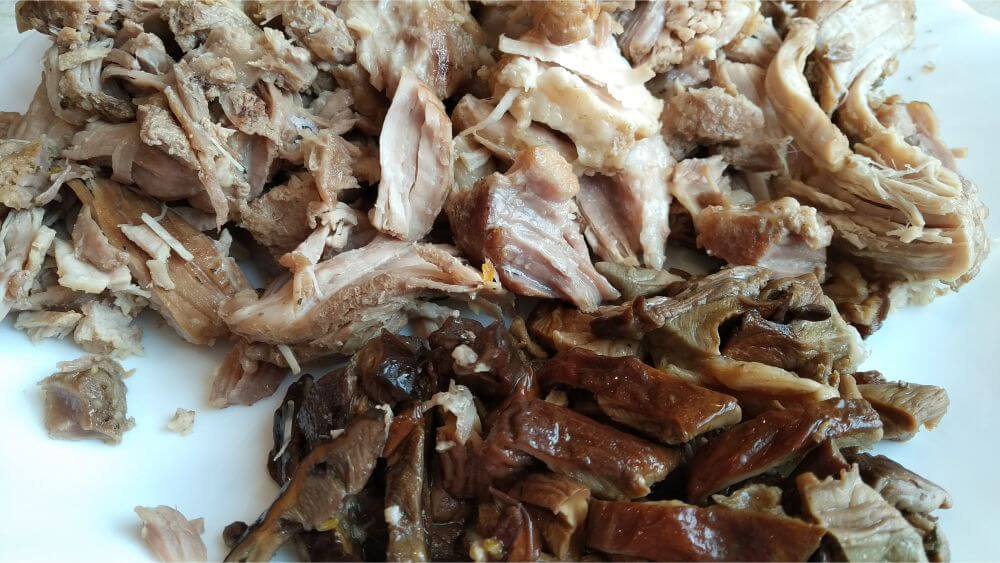 shredded meat and mushrooms for bigos