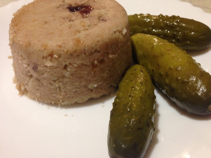 pate with cranberries on a plate with polish sour pickles - instant pot club