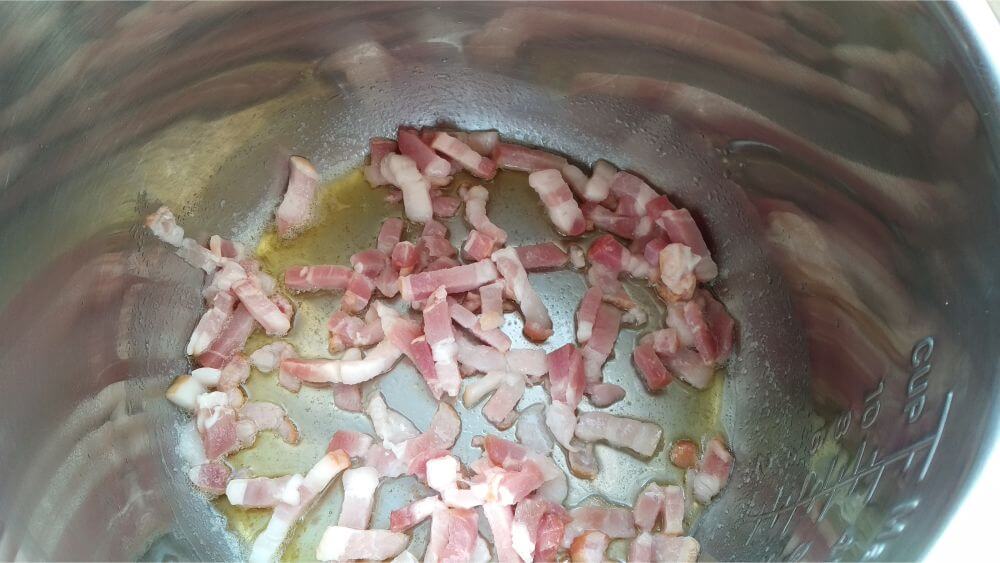 olive oil and bacon inside instant pot