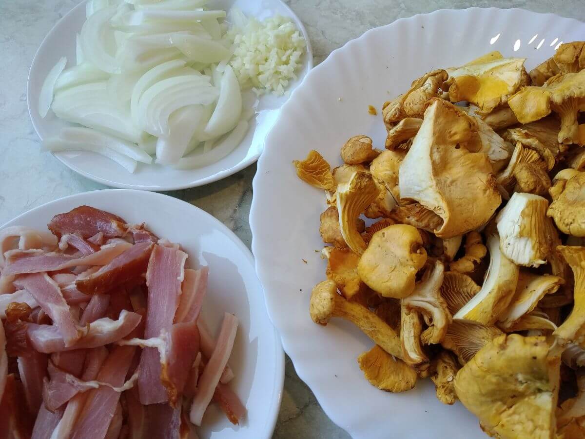 chopped onions bacon and chanterelles